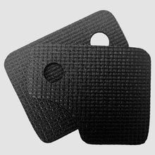Load image into Gallery viewer, Two black textured square pads with a central circular cutout on a white background